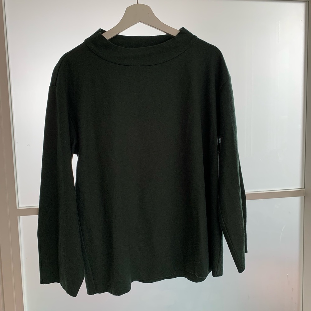 Hunter green felted wool mock turtleneck top from Eileen Fisher.